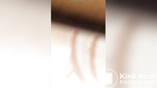 Ebony pissing toilet