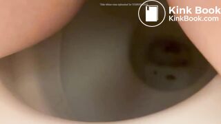 Girl shitting into toilet