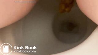 Girl shitting into toilet