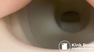 Girl shitting into toilet