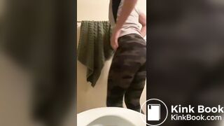 Cute girl pulls down pants for a quick toilet poop