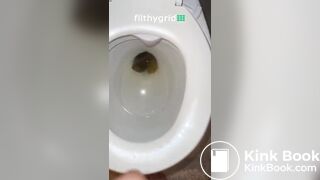Sexy ebony on toilet