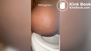 Sexy ebony on toilet