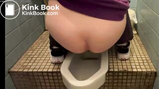 Asian girl pooping on squat toilet