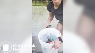 Ebony shitting in bucket