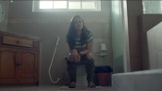 Girl take a shit on the toilet