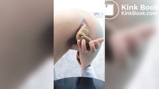 Girl Poo in hand