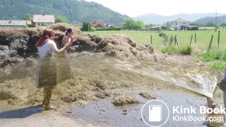 Two girls sprayed with cowshit by a slurry tanker