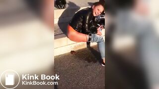 Beautiful female rider poops outdoors.