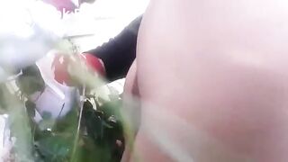 girl takes shit on the grass