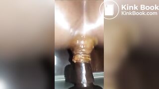 Girl pooping on anal dildo