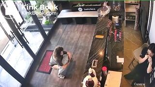 Woman CCTV poop in lobby of Asian restaurant