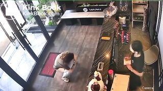 Woman CCTV poop in lobby of Asian restaurant