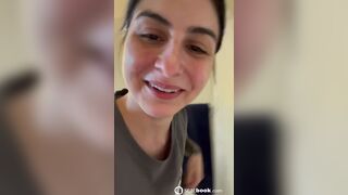 Girl pooping on the toilet with her dog