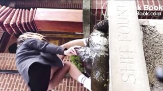 Lady takes a shit on the “shit fountain”