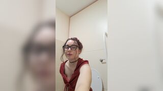 Cute girl poops on toilet