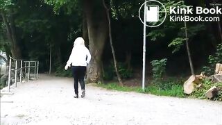 German lady relieves herself in public..