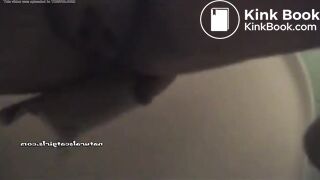Squatting teen pooping on a toilet..