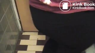 Squatting teen pooping on a toilet..