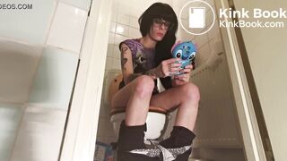 Teen ager pooping on toilet