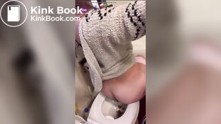 Hot beautiful girl shitting in the toilette