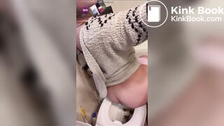 Hot beautiful girl shitting in the toilette