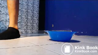 Young Man Pissing and Shitting in a Bowl