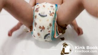 AB boy smearing shit from his very messy diaper