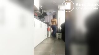 latina shits her jeans in kitchen