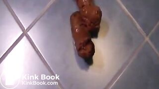 Oiled up ass taking a fat shit